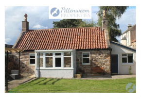 Carpenters Cottage- coastal stay with garden